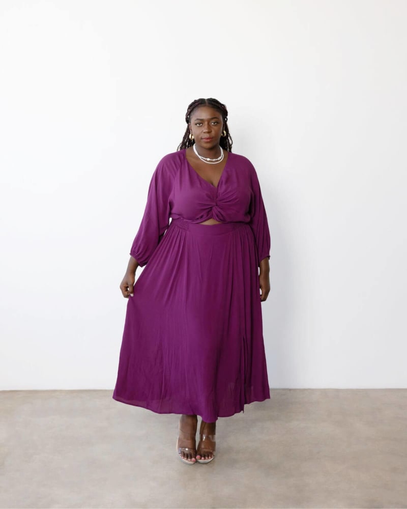 Front of a model wearing a size 3 Carla Twist Midi Dress in Dark Berry by Dani Marie. | dia_product_style_image_id:312369